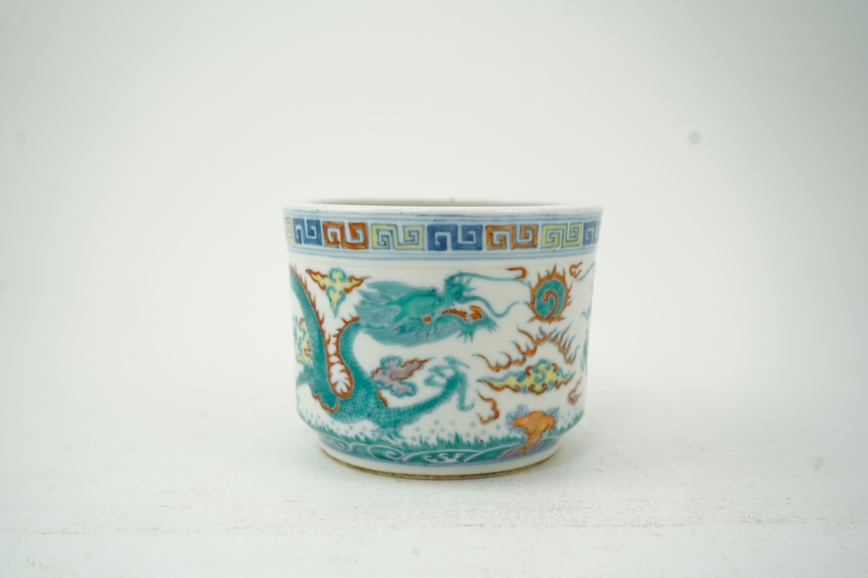 A Chinese doucai ‘dragon’ brushpot, Guangxu six character mark